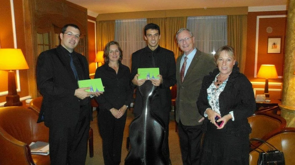 Daniel Claret, Gerard Pastor, and John Frank in a photo at Luxembourg’s Munster Circle after a concert.